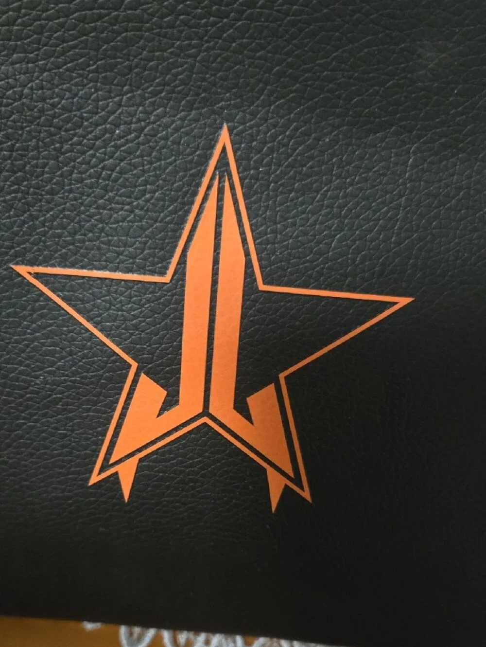 Jeffree Star Black Cosmetic Bag with Orange Star Accent